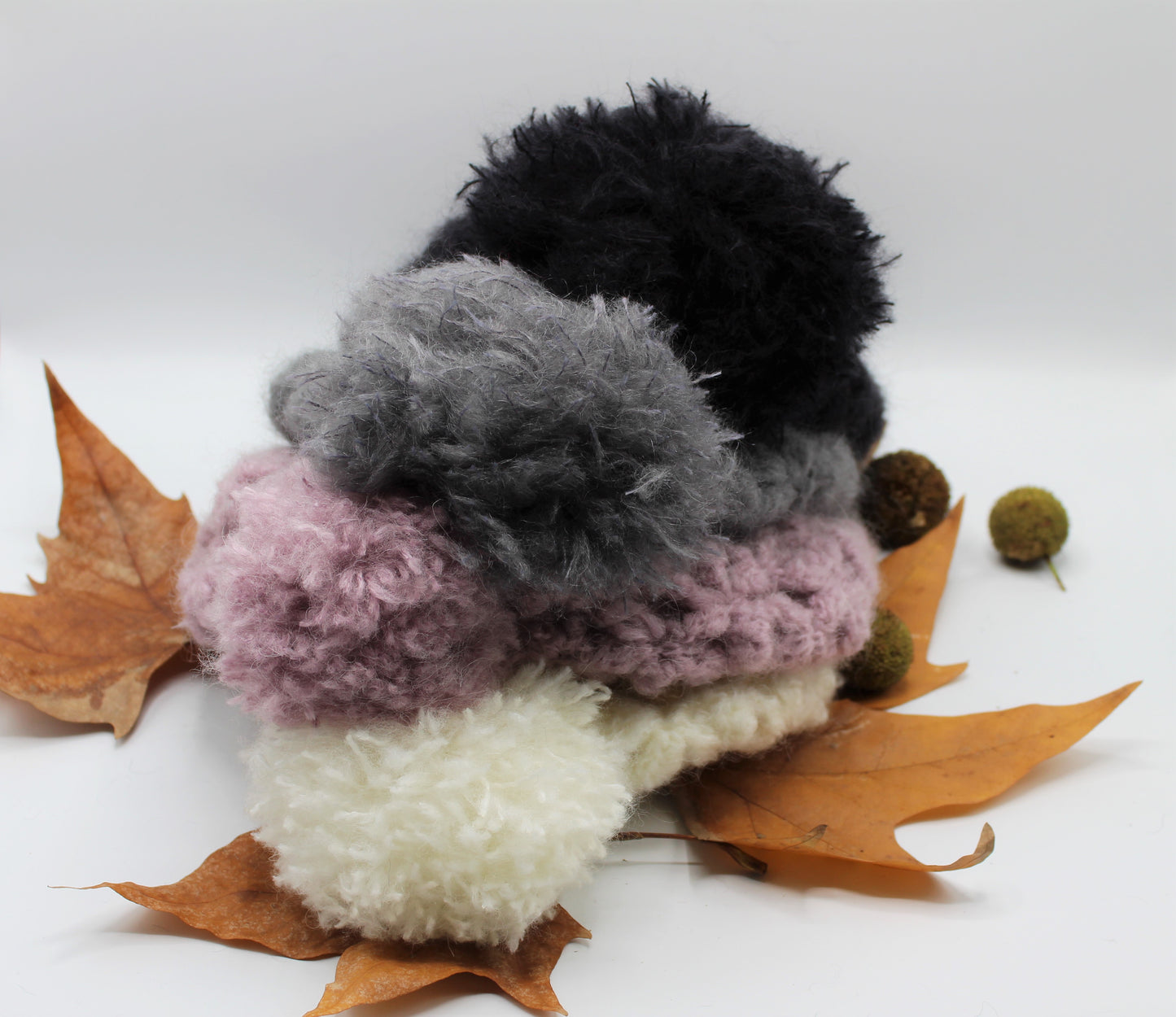 Cappello con ponpon in lana e mohair