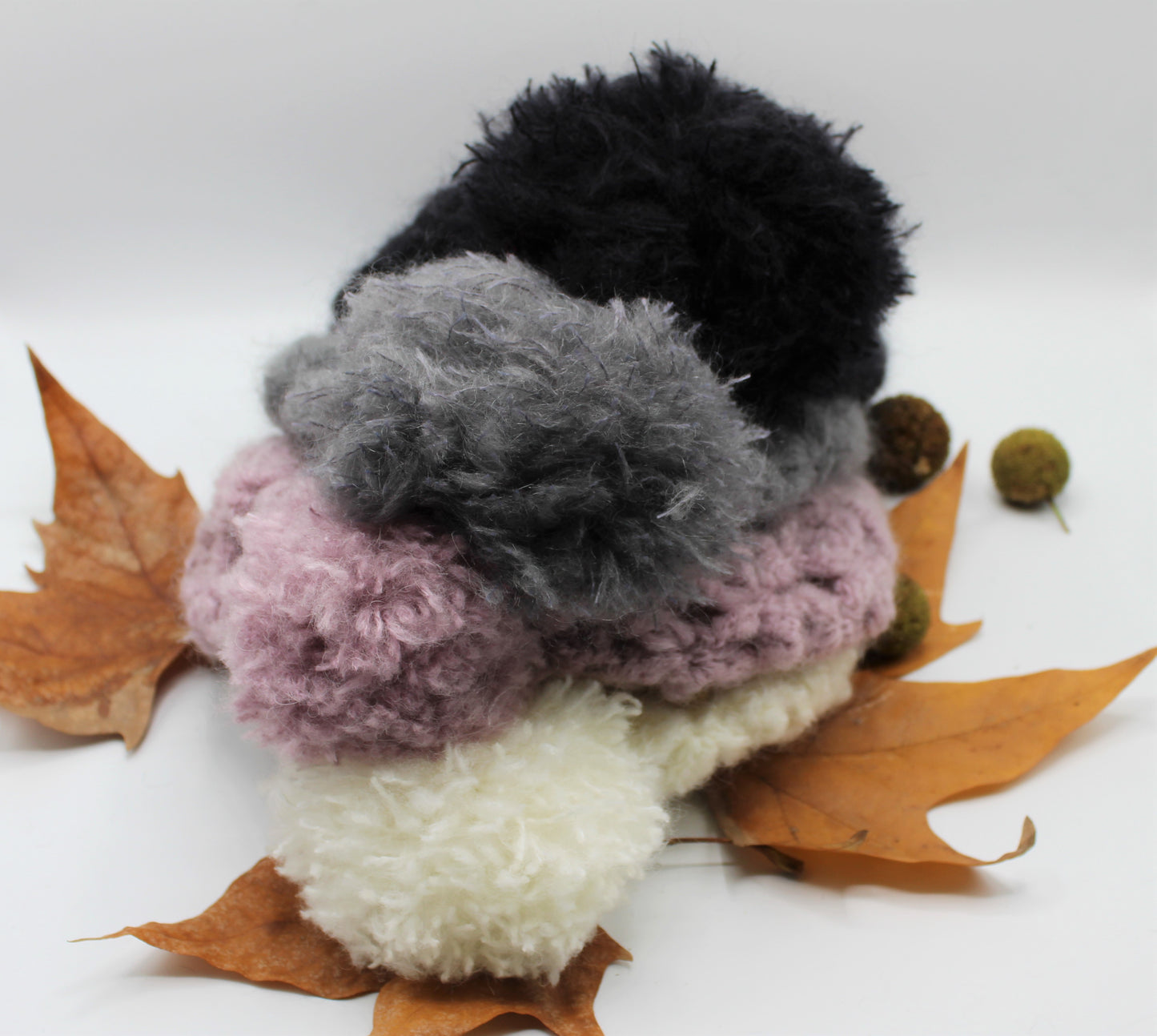Cappello con ponpon in lana e mohair