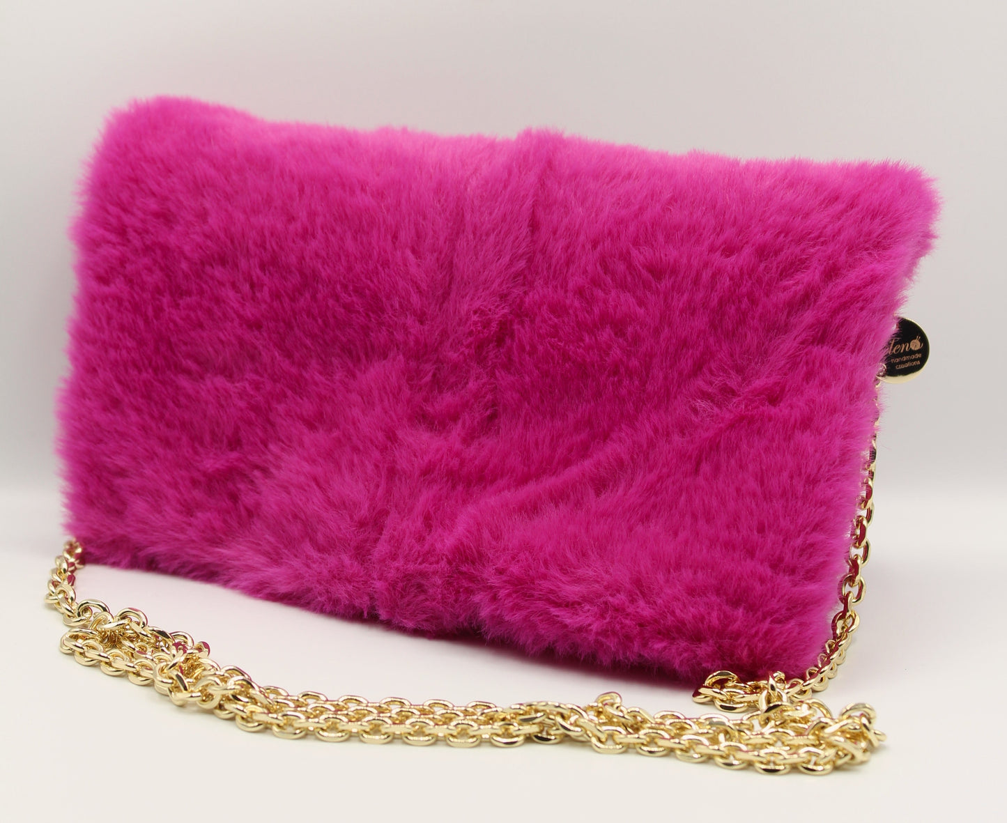 Pochette in ecopelliccia con tracolla - Fucsia
