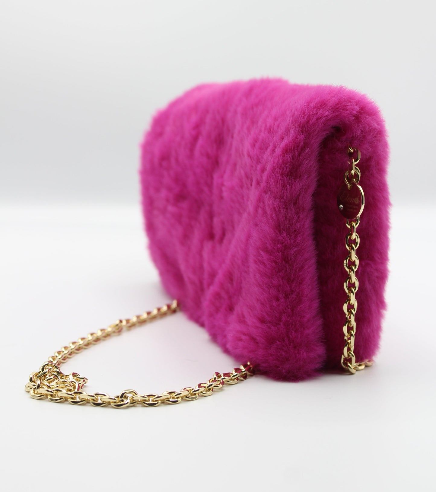 Pochette in ecopelliccia con tracolla - Fucsia