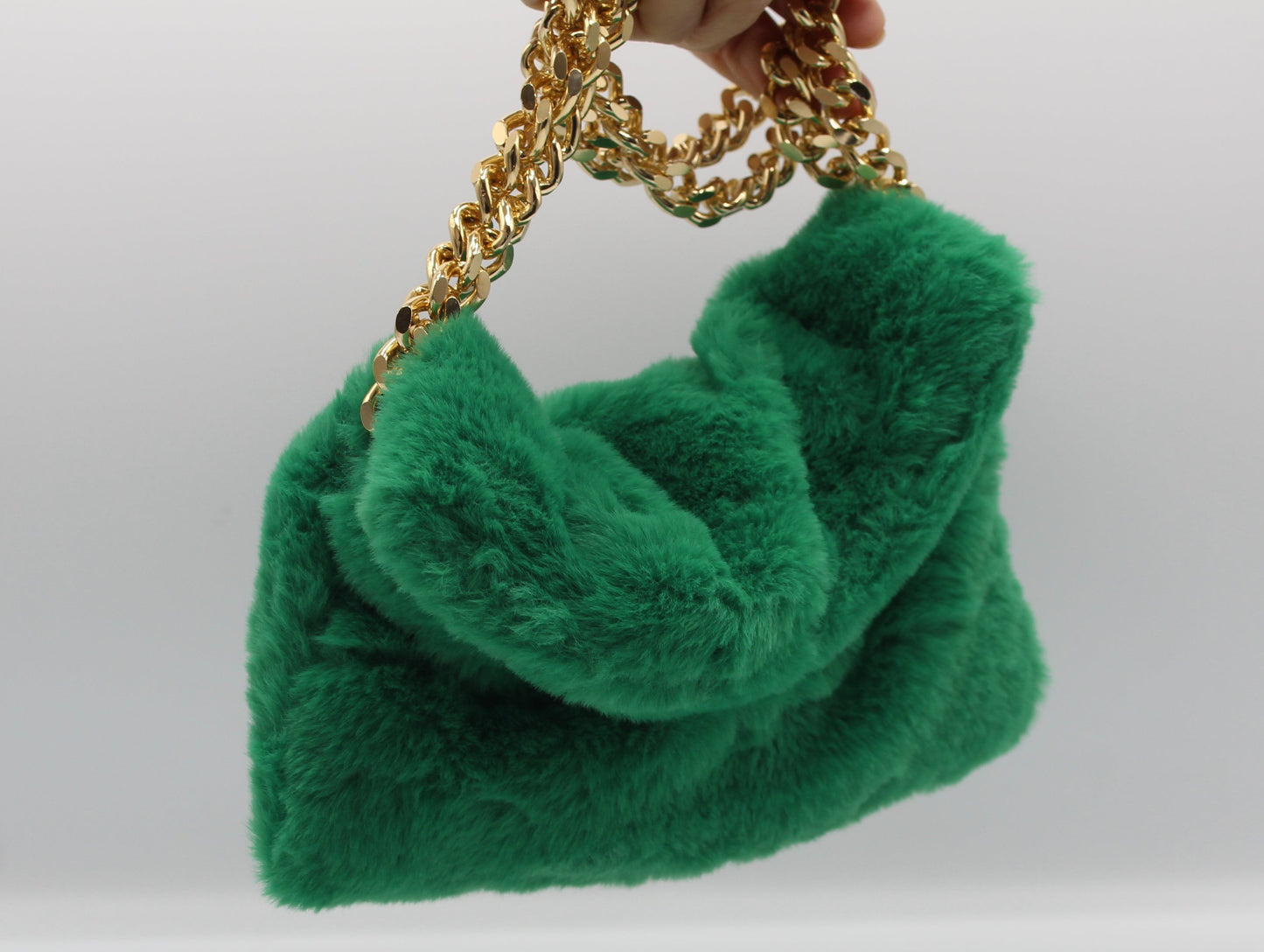 Pochette in ecopelliccia con tracolla doppio filo - Verde