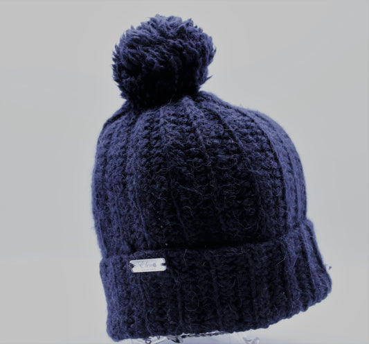 Cappello con pompon a coste 