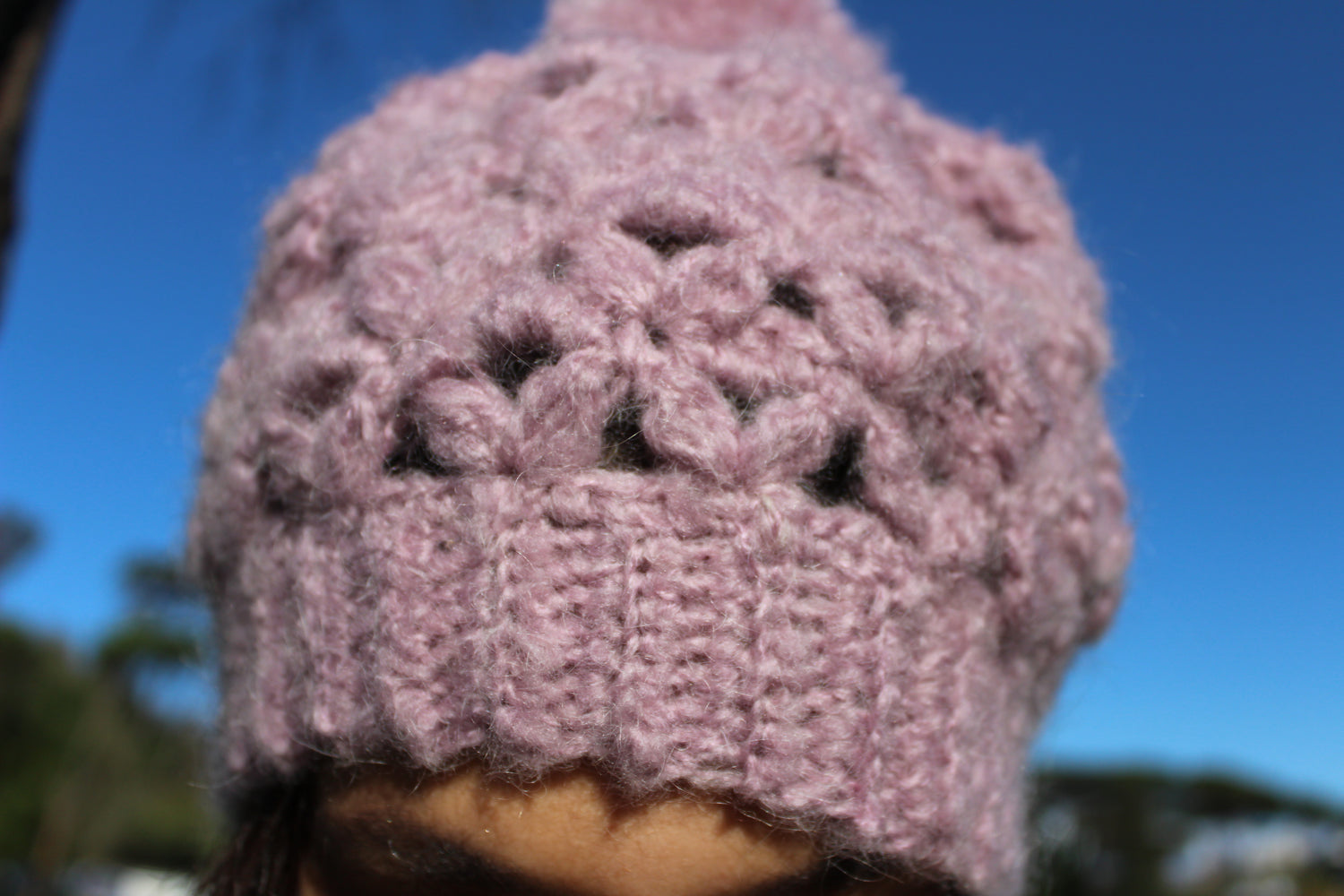 Cappello in 100% lana merino e pon pon rosa